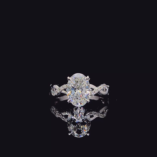 Oval cross-band engagement ring