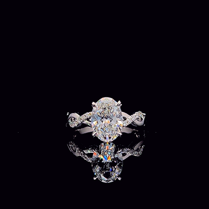 Oval cross-band engagement ring