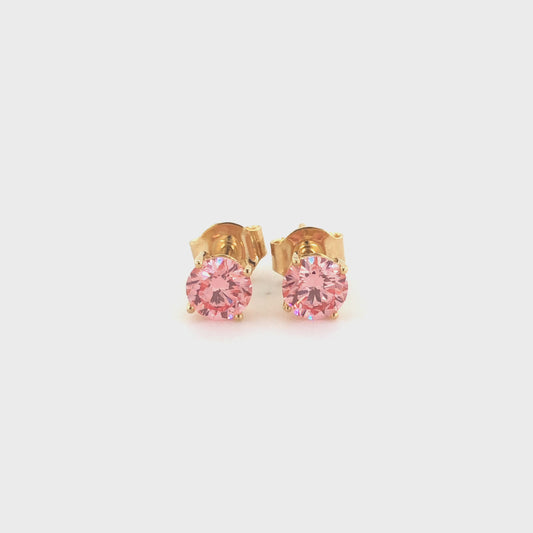 Fancy color diamond studs